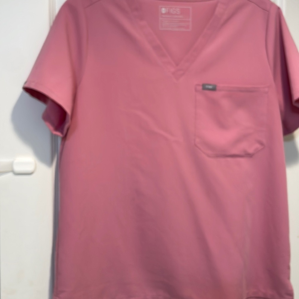 Brand new!! Limited edition chalk pink. Folds from shipping still seen.